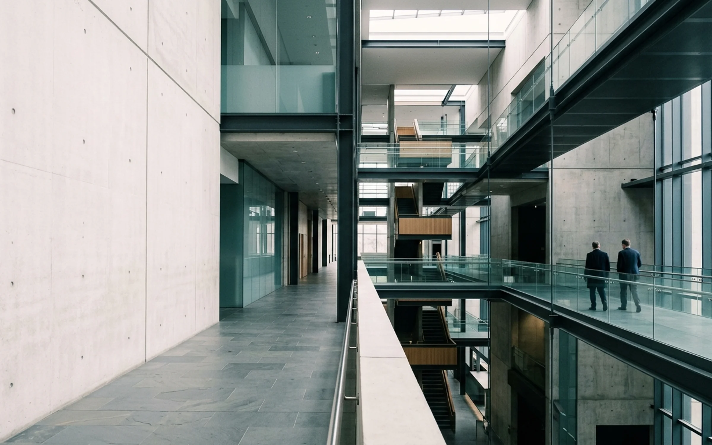 Modern institutional architectural environment showing concrete and glass structural perspective
